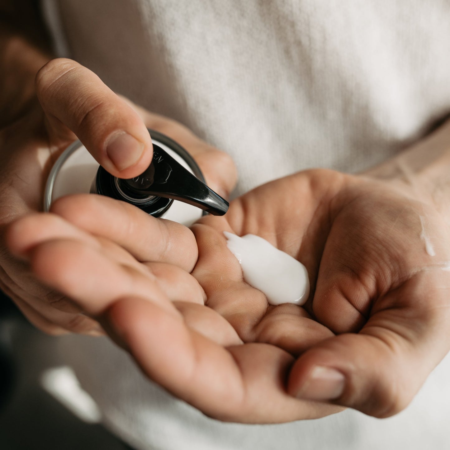 Heather organic hand lotion in glass bottle