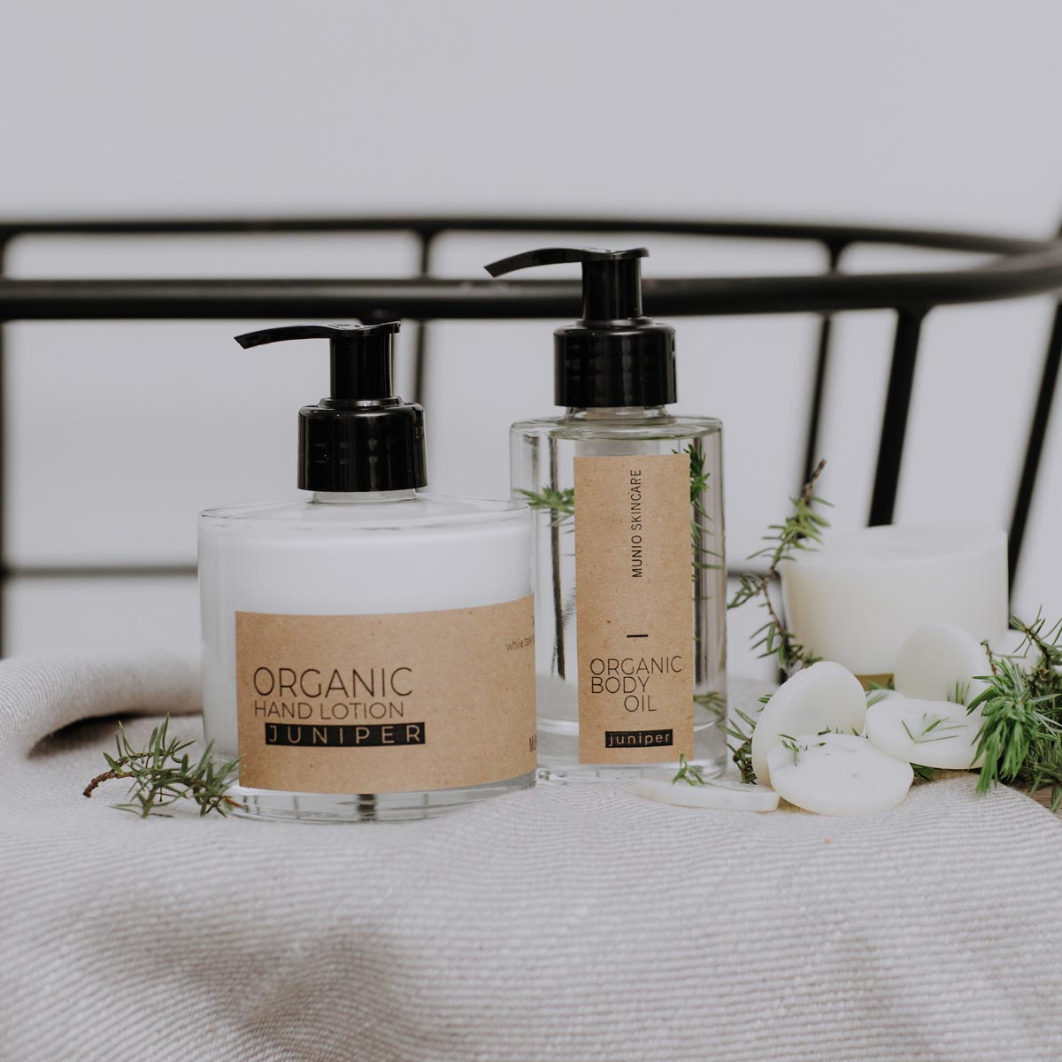 Juniper organic hand lotion in glass bottle