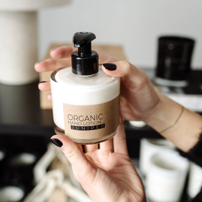 Juniper organic hand lotion in glass bottle